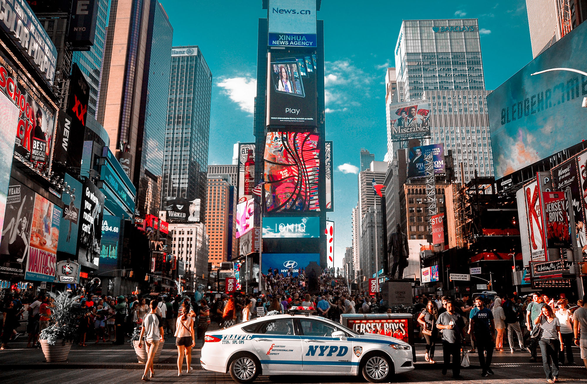 Busy street with bit advertisement