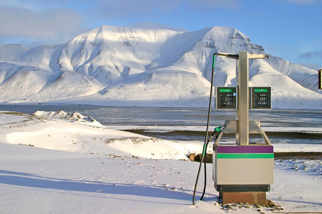 Gas pump in snowy landscape