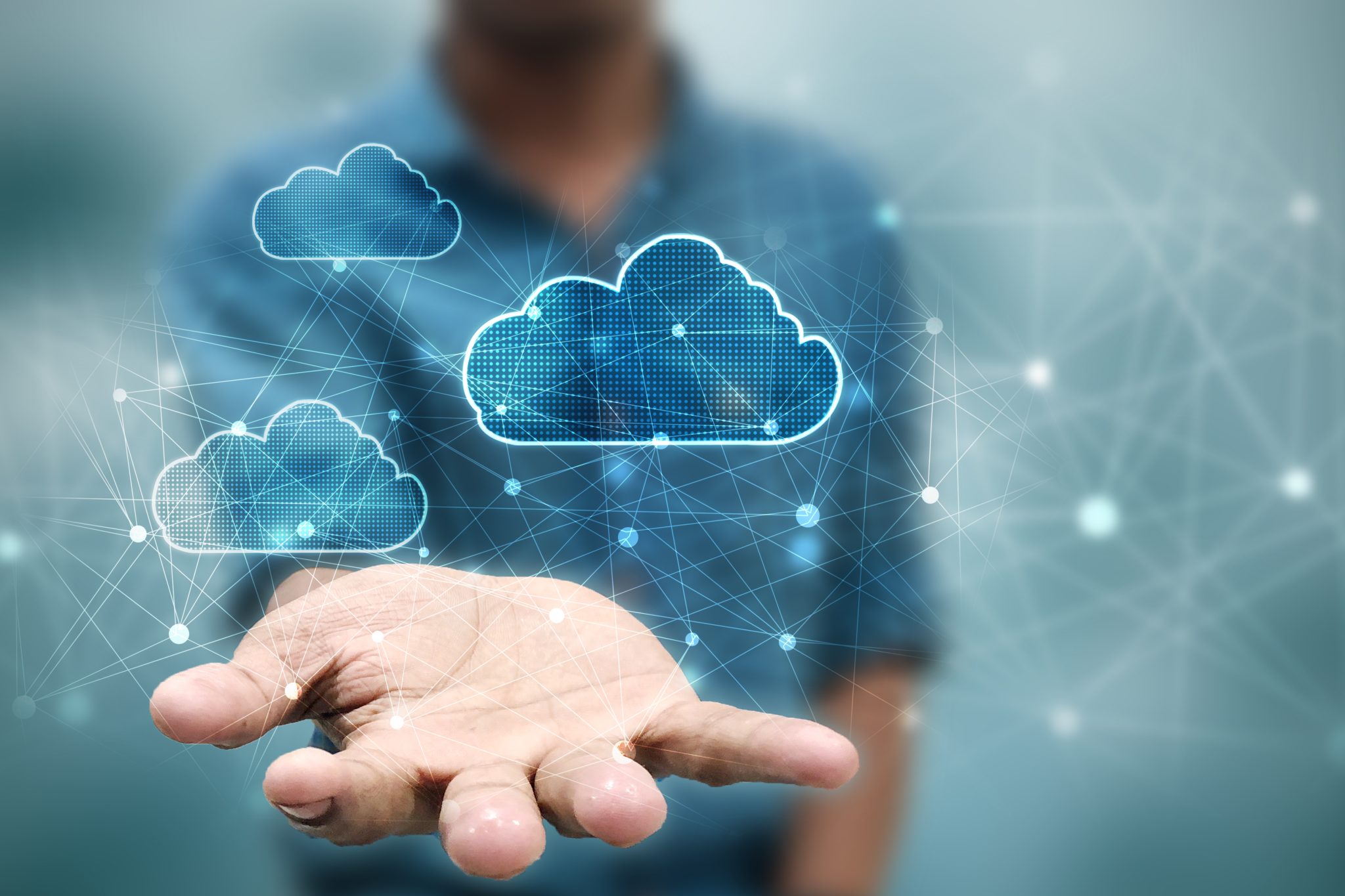Graphic of a torso with hand outstretched and a web of internet clouds in the foreground