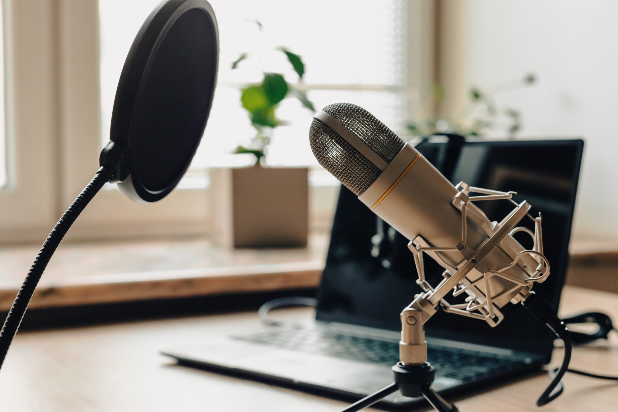 Podcast setup with desk and microphone