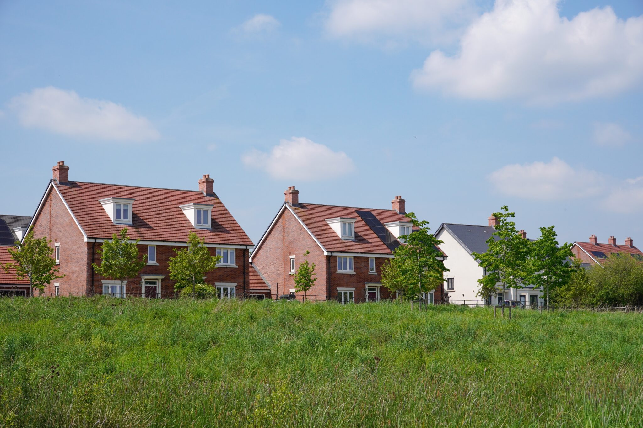 Property real estate. new build housing in the UK. suburban neighbourhood of family homes