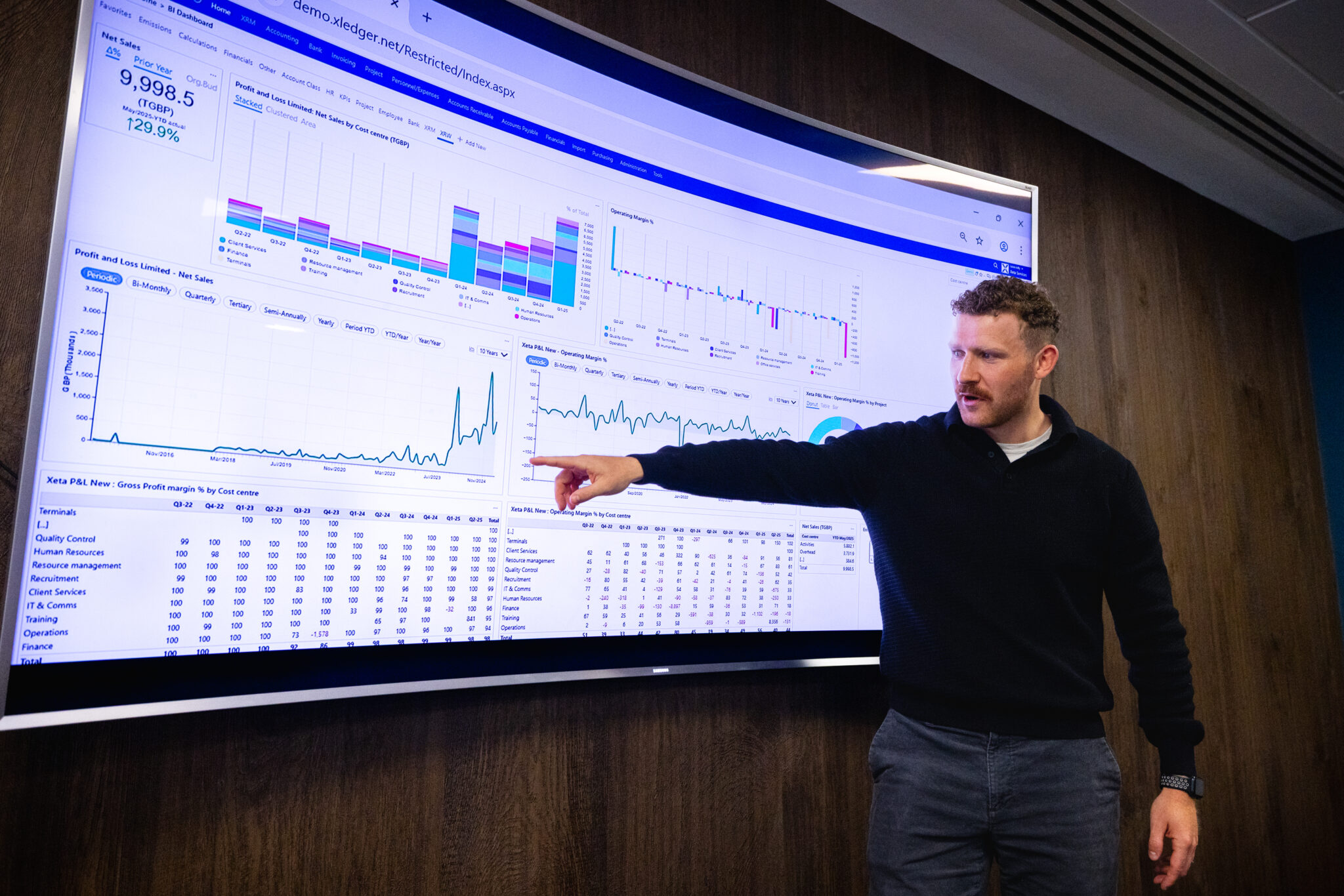 Man presenting Xledger finance software