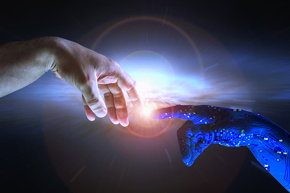 A human hand and a glowing digital robotic hand reach toward each other, their fingertips touching in a burst of light, symbolizing the connection between humanity and artificial intelligence.