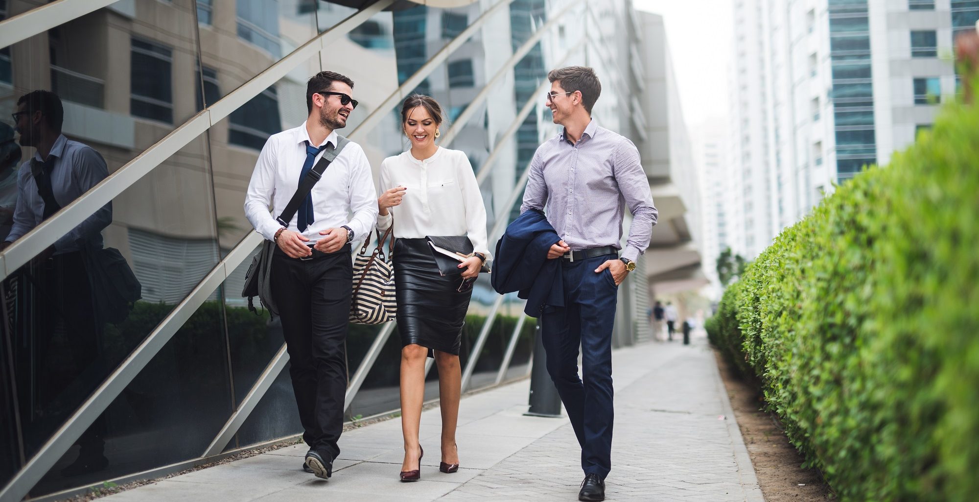 Business men and woman walking