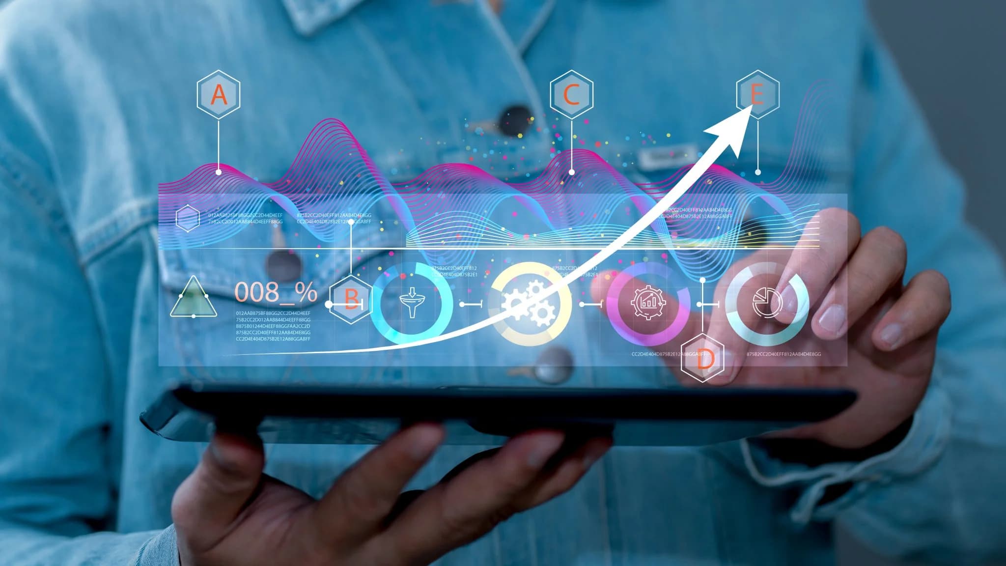 Person holding a tablet with digital analytics and growth chart overlay